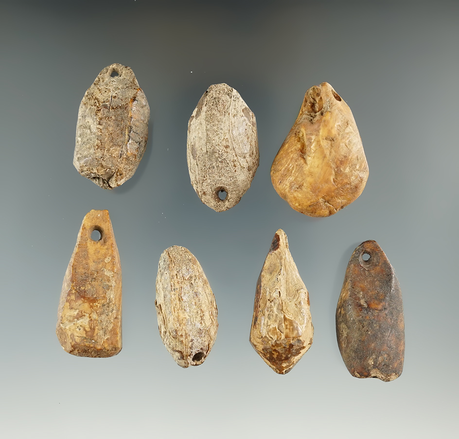 Group of seven drilled bolos found in Alaska.