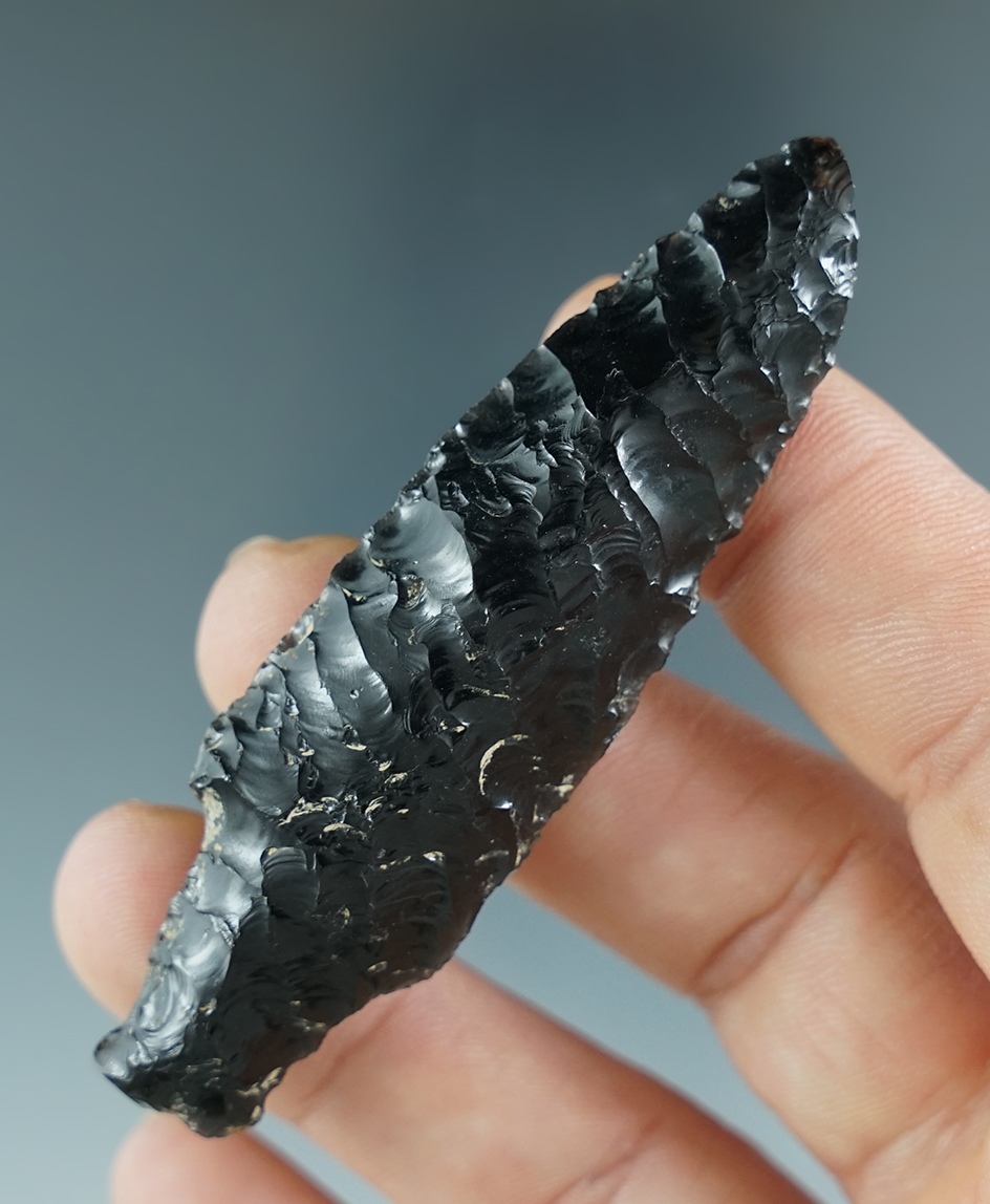 Nicely styled 2 7/8" Kelsey Creek barbed found in Northern California made from obsidian.