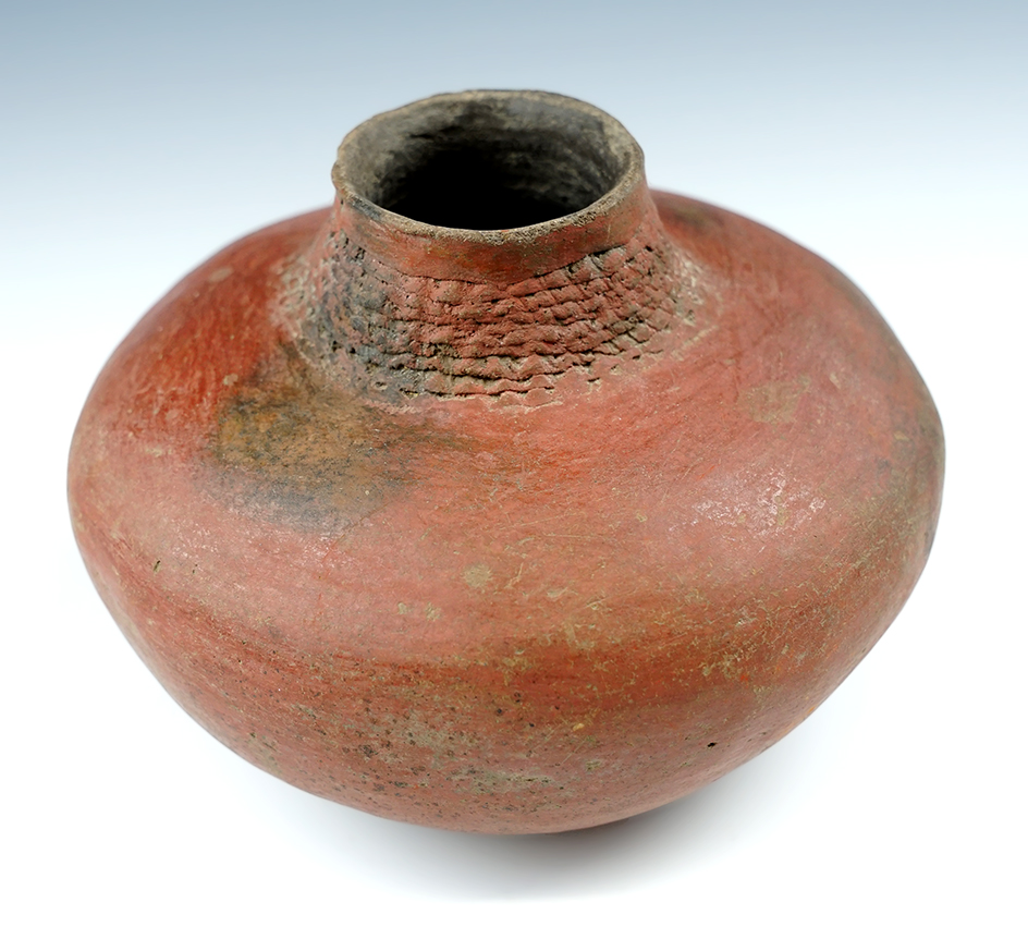5 3/4" wide x 4" Short Neck Bottle, found in New Mexico.