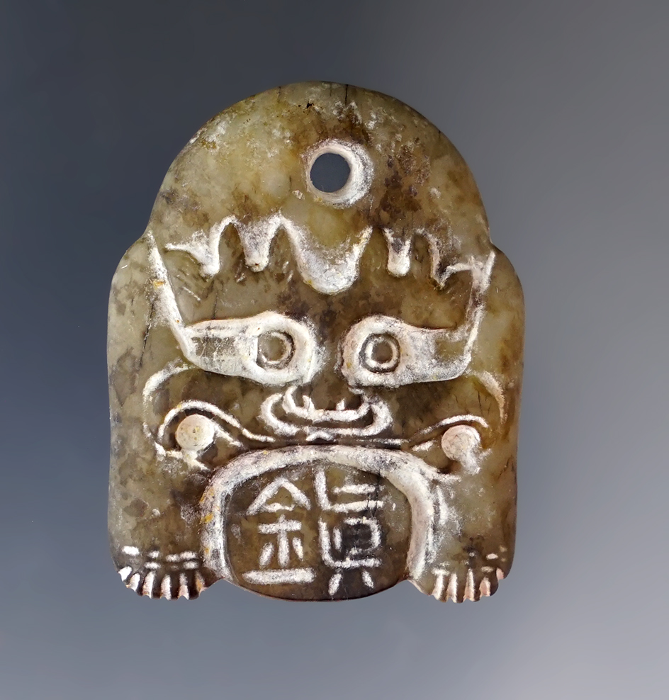 1 9/16" Stone pendant of an elf, Southeast Asia.