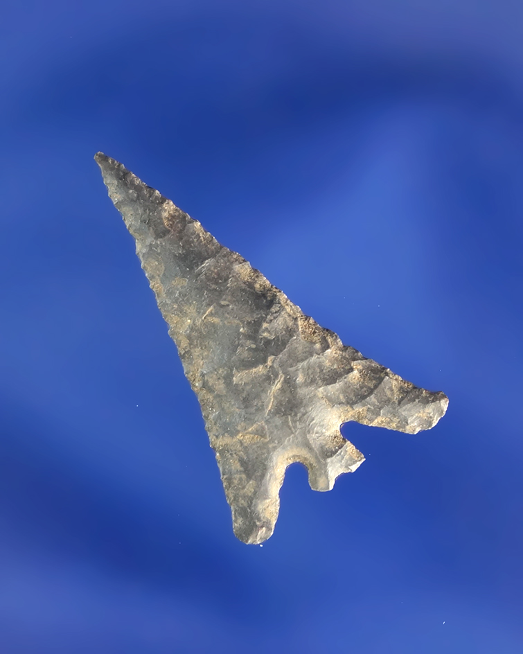 Delicately made 1" Columbia Plateau split-stem with perfect flaking and a heavy patina.