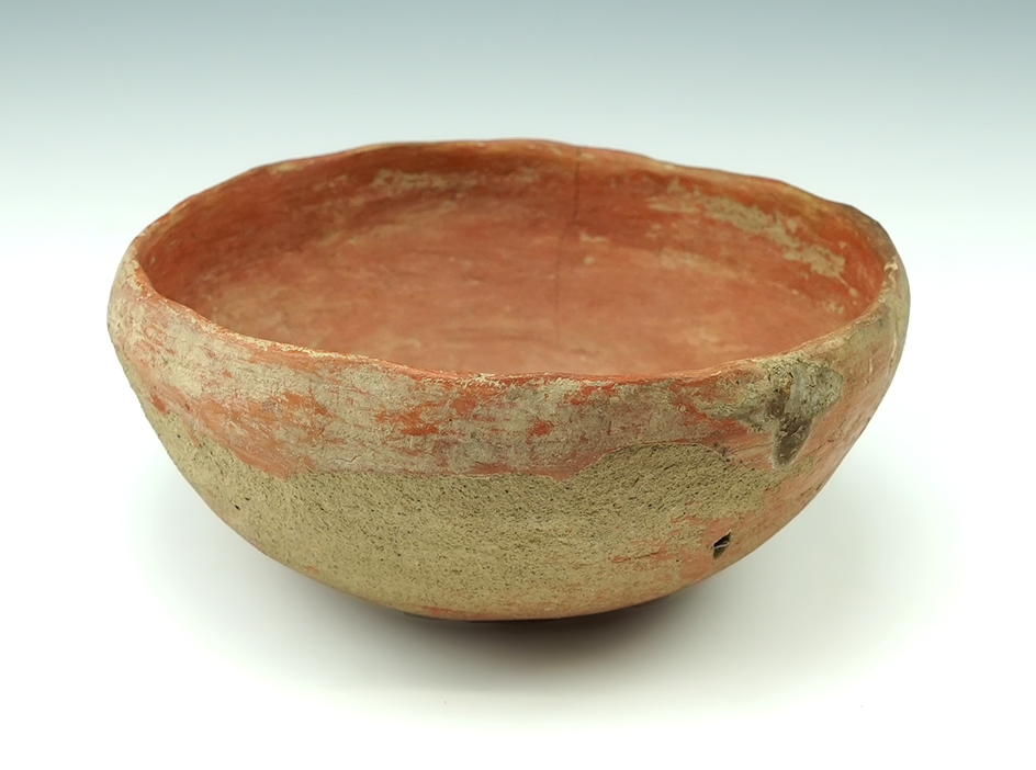 5 5/8"  New Mexico pottery bowl in nice overall condition.  A couple reattached chips in interior.