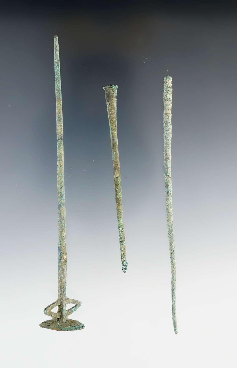 Set of 3 Roman Bronze Hairpins that are well patinated. The largest is 4 3/4".