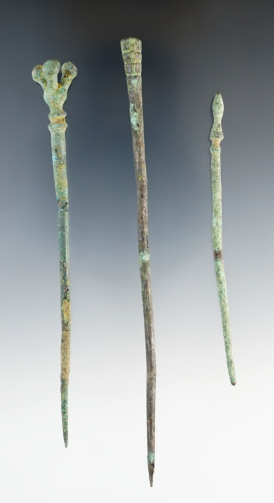 Set of 3 Roman Bronze Hairpins that are well patinated. The largest is 5 3/16".