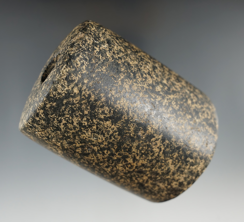 3 1/2" highly polished granite Bannerstone that is partially drilled found in Barron Co., Kentucky.