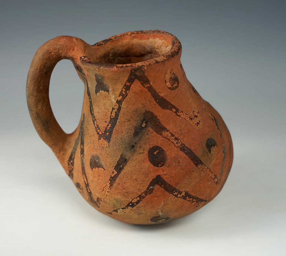 3 3/4" tall x 3" wide 19th Century Pueblo handled pitcher in nice condition.
