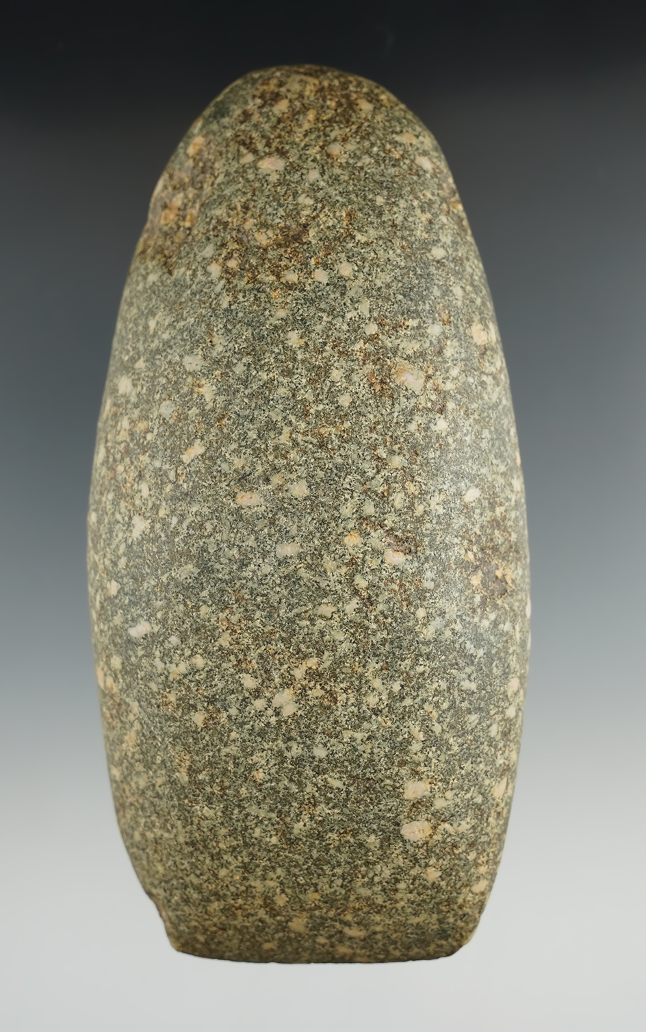 Well crafted 5 3/16" Porphyry Celt found in Missouri.
