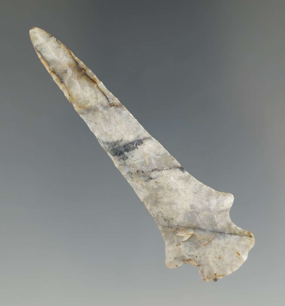 2 7/8" Notched Drill made of colorful blues with stripes running throughout. Richland Co., Ohio.