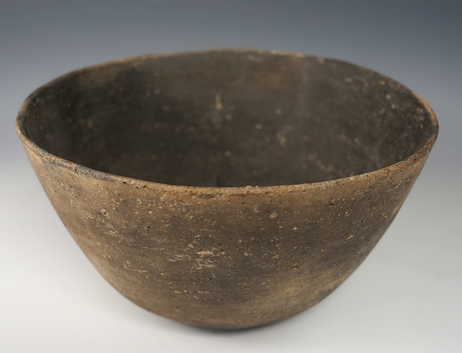 7" Wide x 3 3/4" Tall thin walled pottery vessel found in Clay Co., Arkansas. Some restoration.