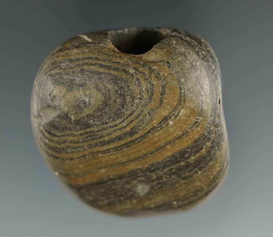 1 3/4" heavily patinated Glacial Slate Bannerstone found in Defiance Co., Ohio. Ex. Faben.