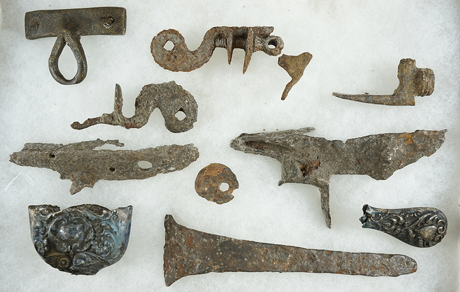 Group of old gun parts and other metal artifacts excavated at the Fort Niagara area by Harry Haven.