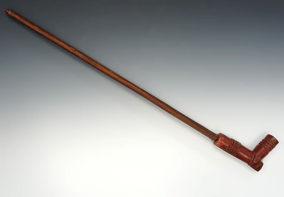 4 5/8" long x 3 1/4" tall Plains Indian Catlinite Pipe with original 22" wood stem. Circa 1870-1880.