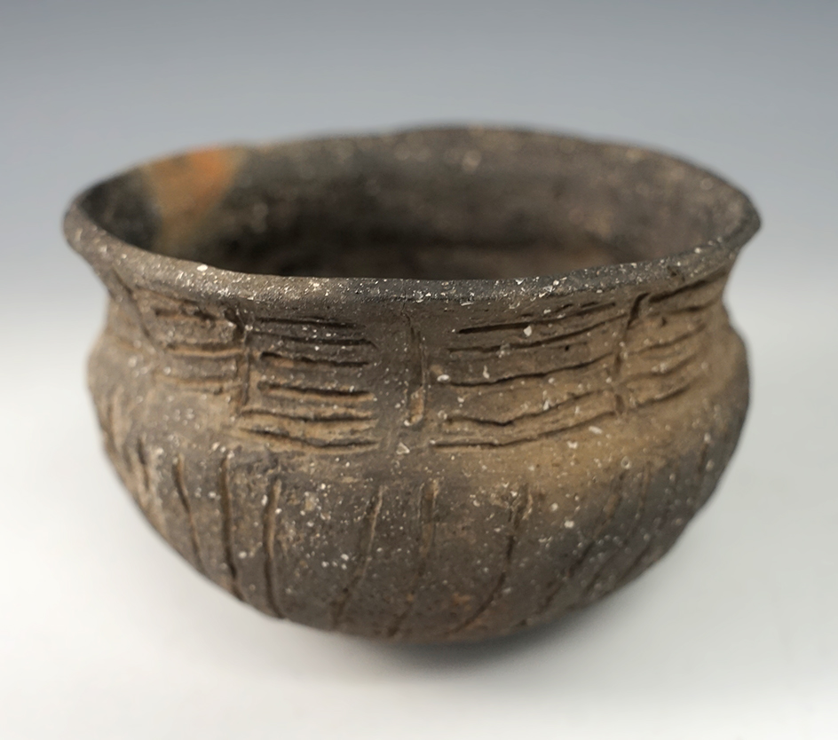 3 5/8" wide x 2 3/8" tall shell tempered clay Caddo jar - Clay Co., Arkansas. Some restoration.