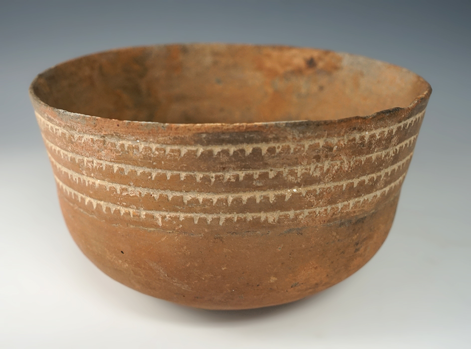 6" wide x 3 1/4" tall thin-walled Caddo pottery vessel found in Arkansas with some restoration.
