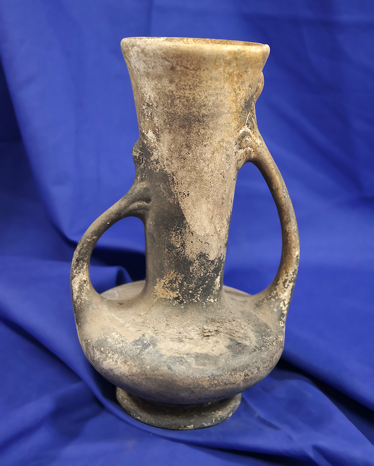 7 5/8" tall ancient Greek pottery Dual Handled Vase in excellent condition.