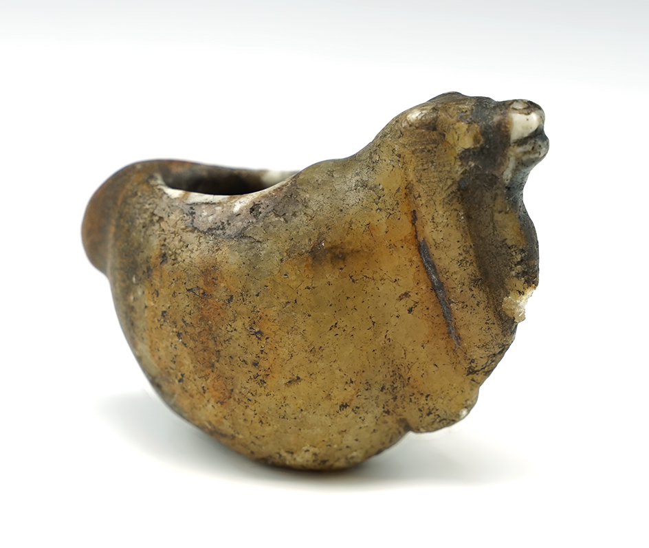 Nicely patinated and colorful 2" tall Alpaca Canopa found in Peru.