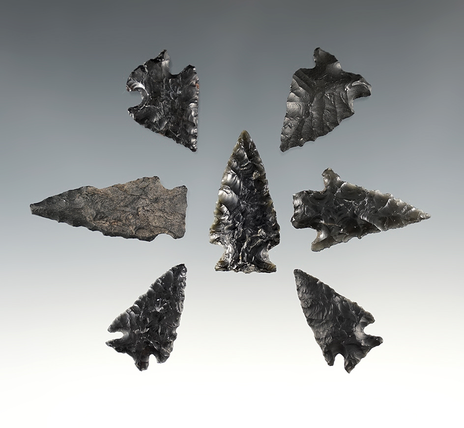 Set of 7 Elko points made from Obsidian. Found in Oregon. The largest is 2 11/16".