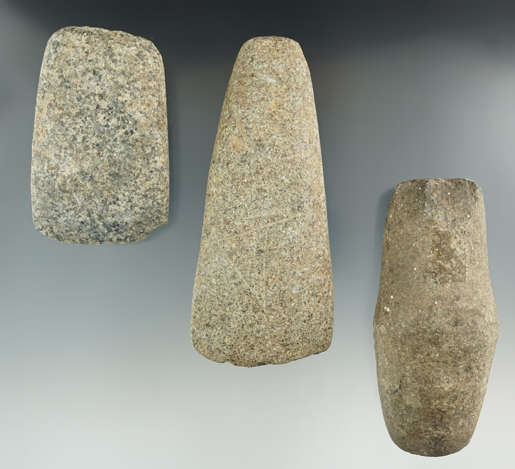 Three stone tools found in Indiana including two Celts and a nicely styled Humped Adze.