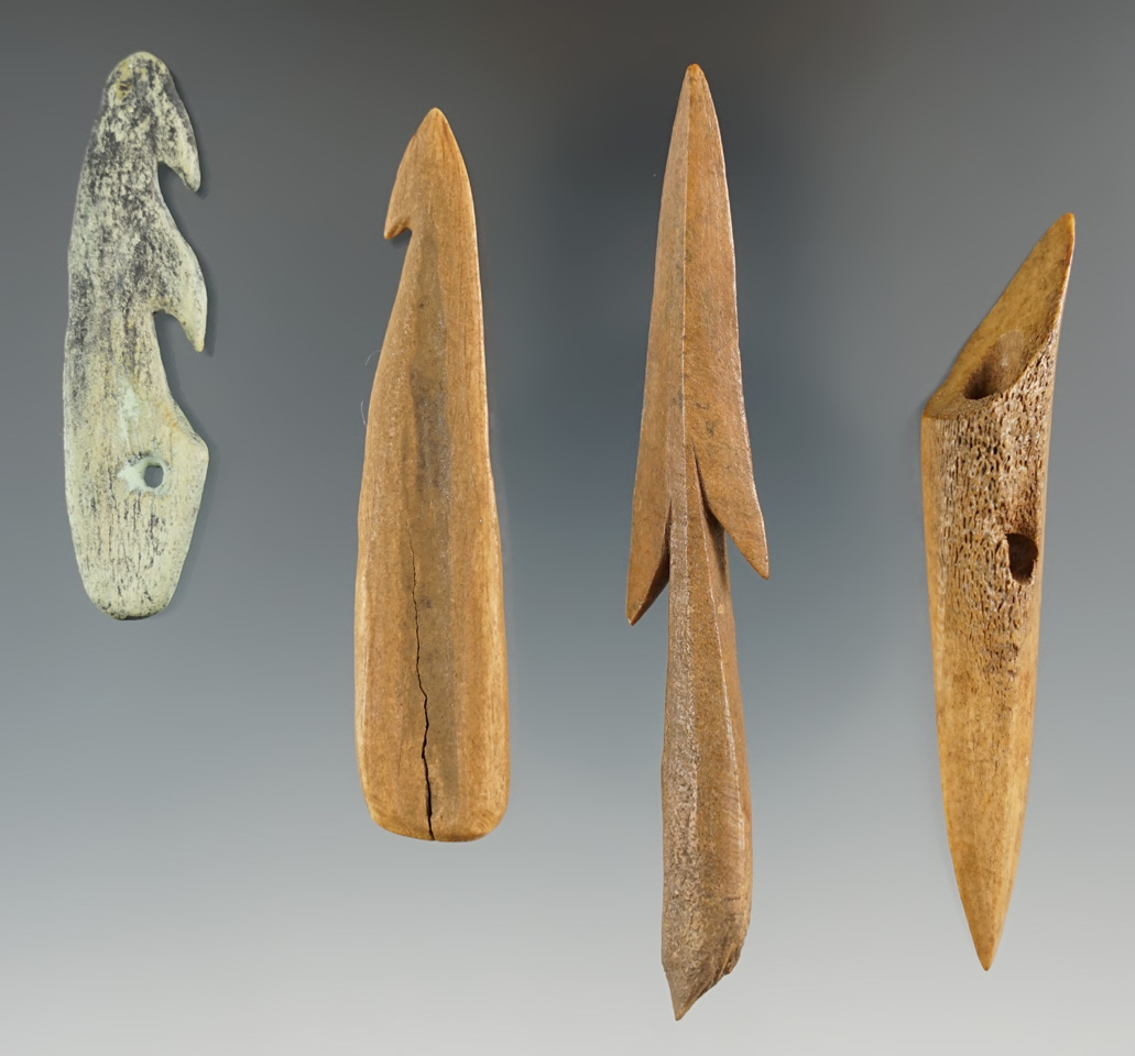 Set of four bone harpoon tips found in Alaska, largest is 3 13/16".