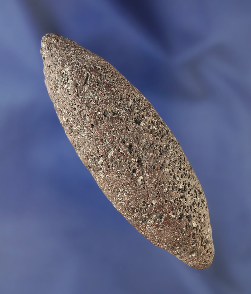 3 9/16" long desert type Atlatl weight from the Great Basin area made from Scoria.