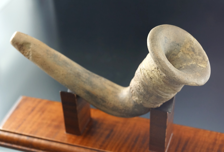 5 7/8" Trumpet Bowl Clay Iroquois Pipe with partial restoration to the bowl, and stem area.