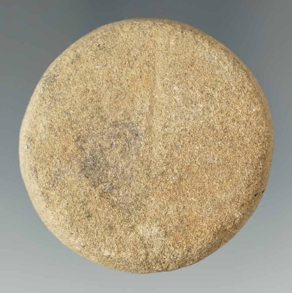 1 3/4" Ft. Ancient sandstone incised Discoidal/game disc. Found in Stockport, Ohio.