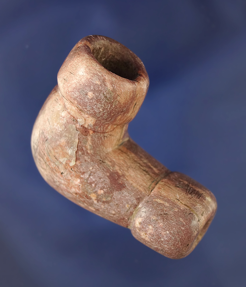 Beautiful two-tone color on this 2" long Catlinite elbow pipe found in South Dakota.