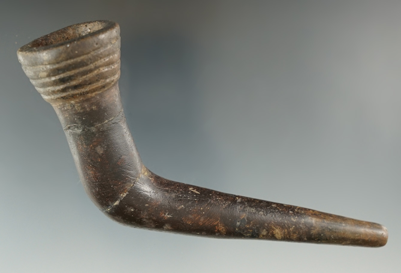 4 3/4" long Iroquois Clay Ring Bowl Pipe which is broken and glued. Jefferson Co., New York.