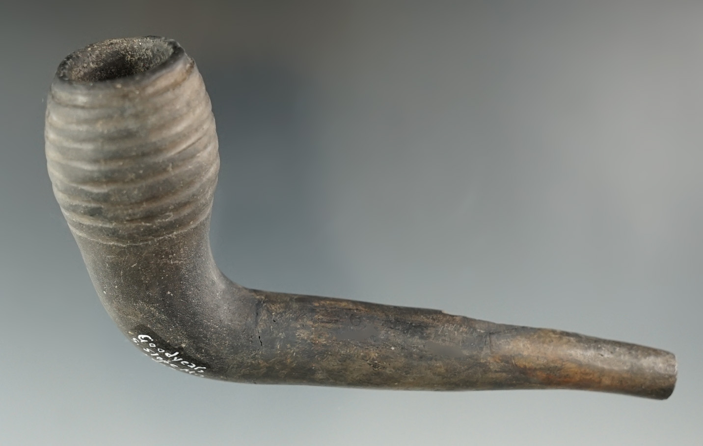 4 3/8" Iroquois Ring Bowl Pipe which is broken and mended at the elbow.  New York.