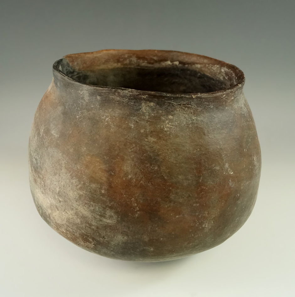 7 1/4" wide by 5 1/2" tall Casa Grande plain jar with two sets of holes near rim for suspension.