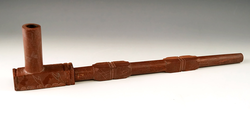 14" Long two-piece Catlinite Pipe that is nicely engraved.