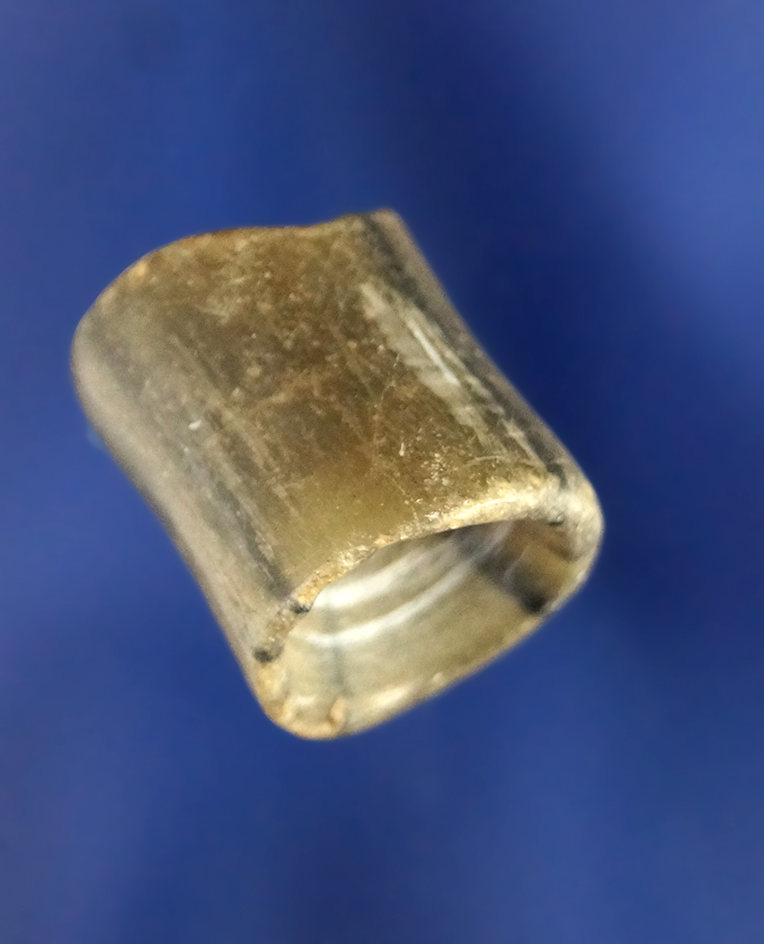 Rare and unique 11/16" perforated ear ornament - Modoc County California. Ex. Comstock.