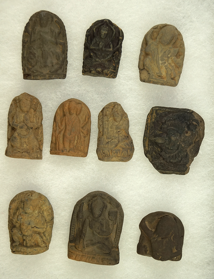 Nice set of 10 vintage clay Buddhist images from Tibet. Largest is 1 3/8".