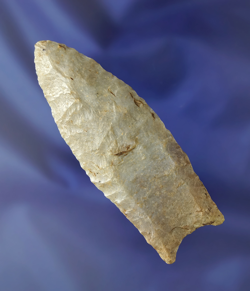 3 7/16" fluted Paleo Clovis - Indiana made from a nicely translucent fossil Flint.  Bennett COA.