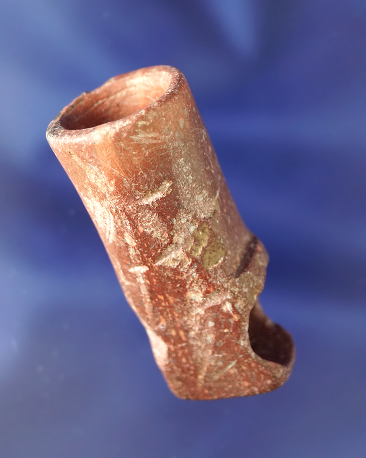 2" tall nicely engraved Catlinite Pipe with some plow scars to surface.