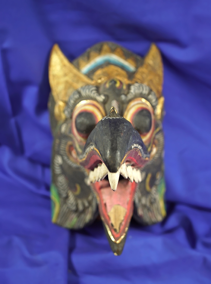Very ornate 9" tall Indonesian wood dragon mask.