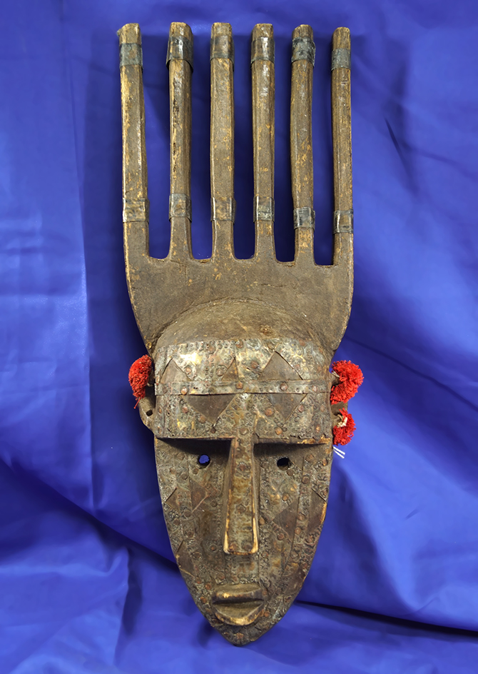 14 1/2" Tall Vintage hand-carved wooden mask in nice condition.  Exact origin unknown.