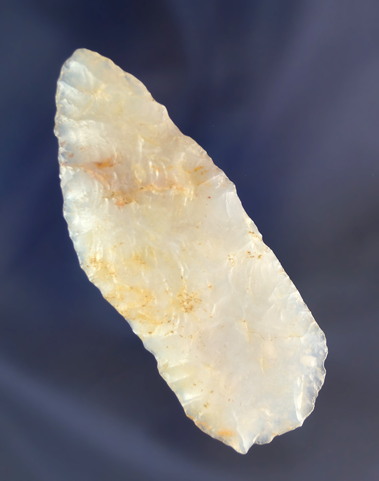 3 1/4" paleo knife made from highly translucent chalcedony with a thinning flute at the base.