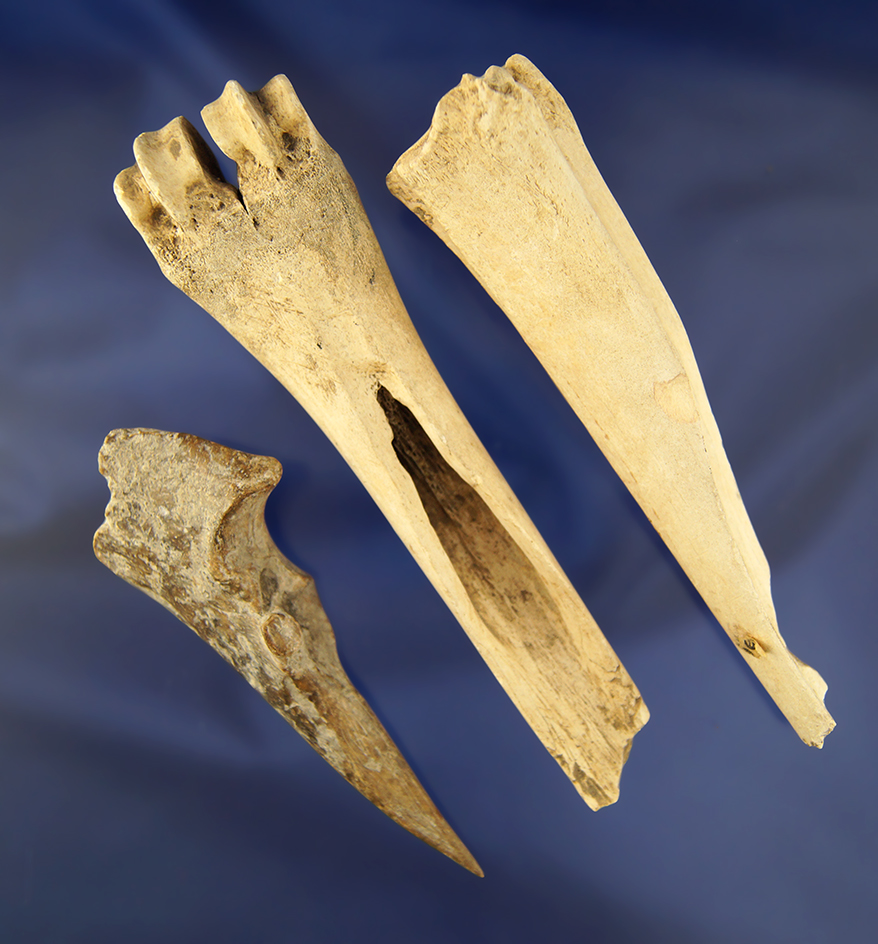 Set of three bone artifacts found in Kentucky including a 4 1/8" heavily patinated trigger awl.