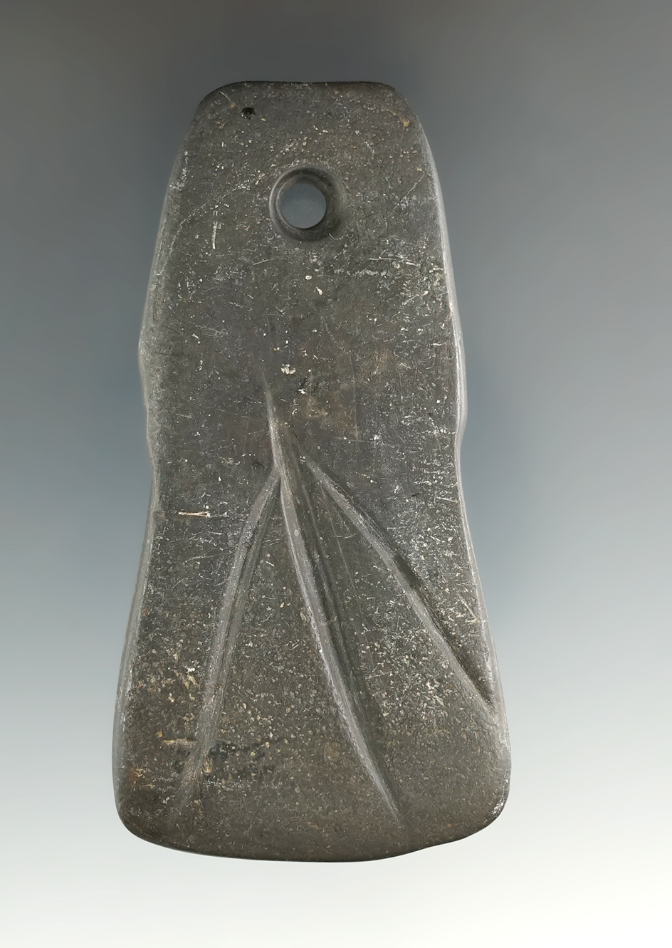 3 1/8" Hopewell Pendant that is engraved and made from black Slate. Found in Montcalm Co., Michigan.