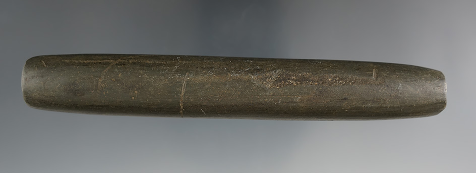 5 1/2" Archaic Tube Bannerstone made from green and black Banded Slate, found in Richalnd Co., Ohio.