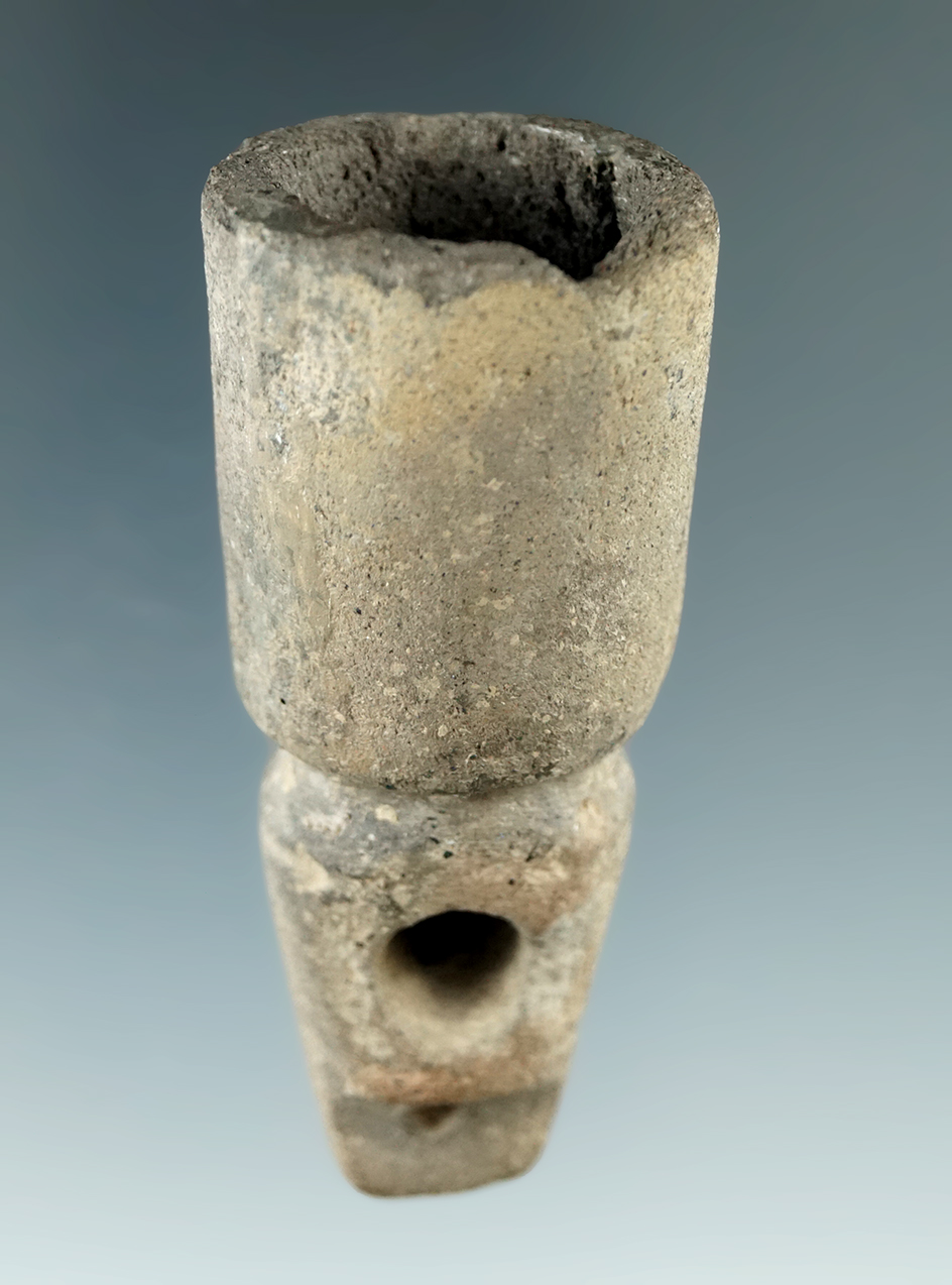 2 5/16" Owasco Vasiform clay pipe with a drilled Keel for suspension found in New York.