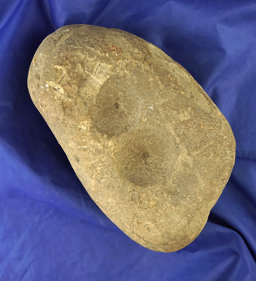 6" long Nutting Stone with divots on both sides found in Ohio.