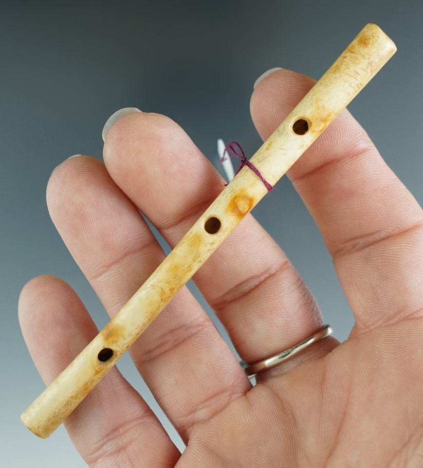 3 7/8" three hole bone flute in excellent condition found in North Dakota.