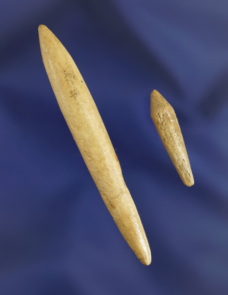 Pair of bone projectile points, largest is 2 1/2". Found in a cave near Burns Oregon.