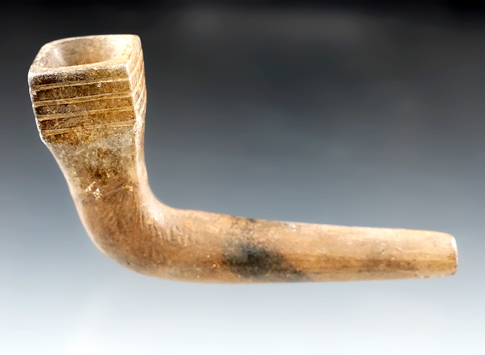 Very unique squared bowl style on this 3 7/8" Iroquois Clay Pipe with restoration to the bowl area.