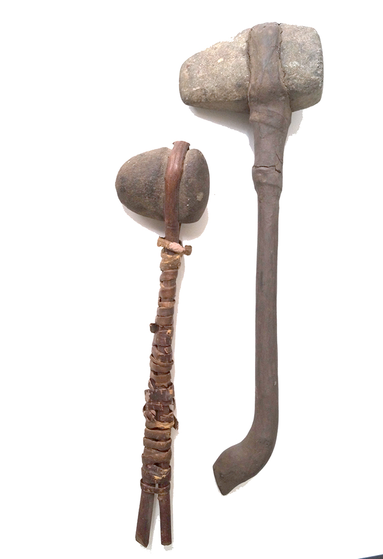 Authentic 5" axe and 3" hammerstone which were hafted in modern times for display.