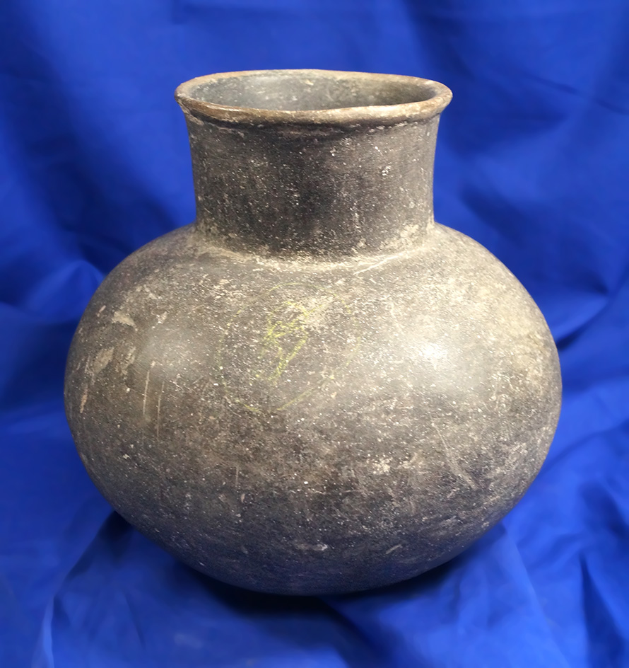 7 1/4" tall Mississippian bottle and nice condition.