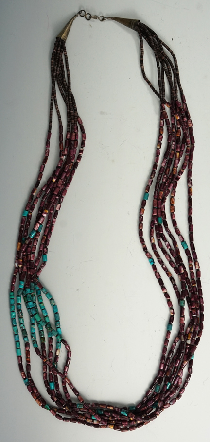 Beautiful five strand necklace, each strand measures 30" long.