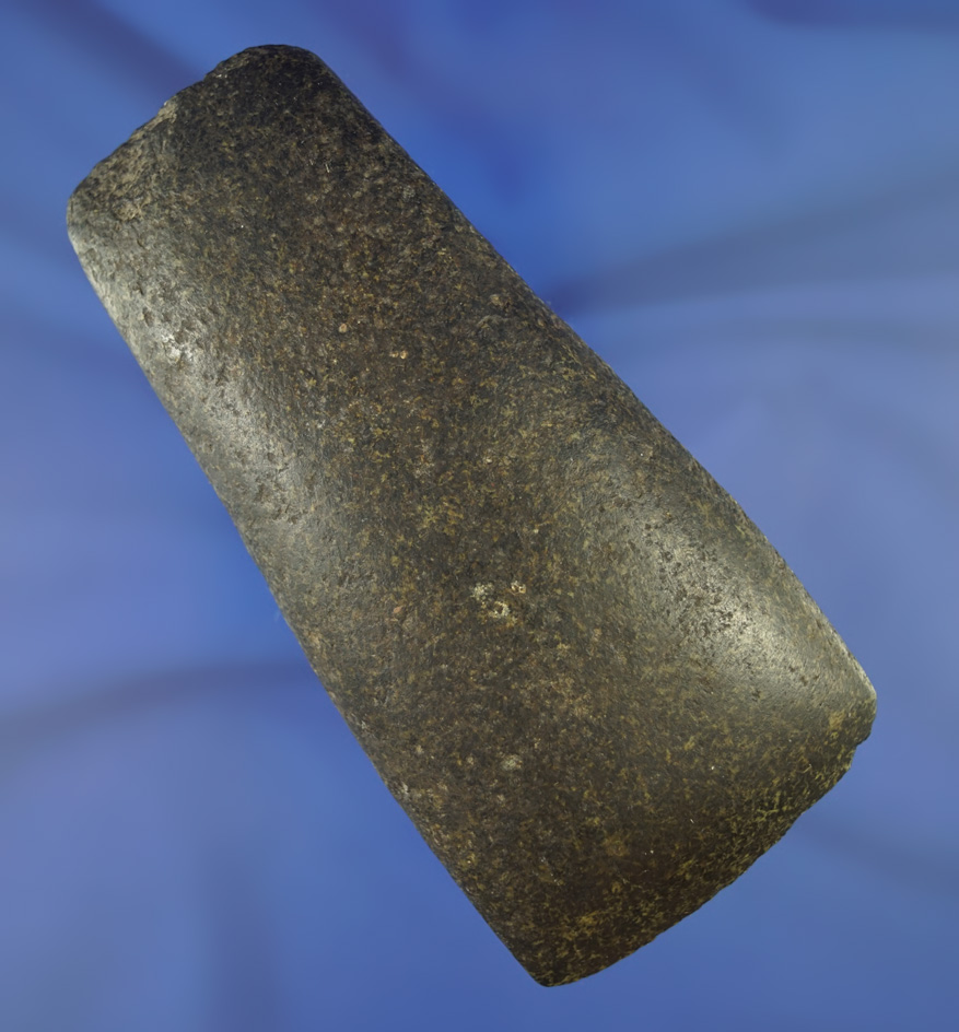 Highly polished 4 13/16" Hardstone Celt with some old damage to the poll area.  Found in MI.